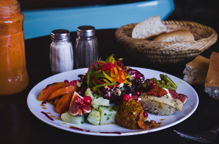 A plate of vibrantly coloured Syrian food.